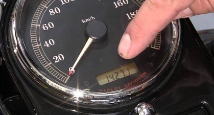 What do the warning lights on a Harley Davidson Speedometer mean